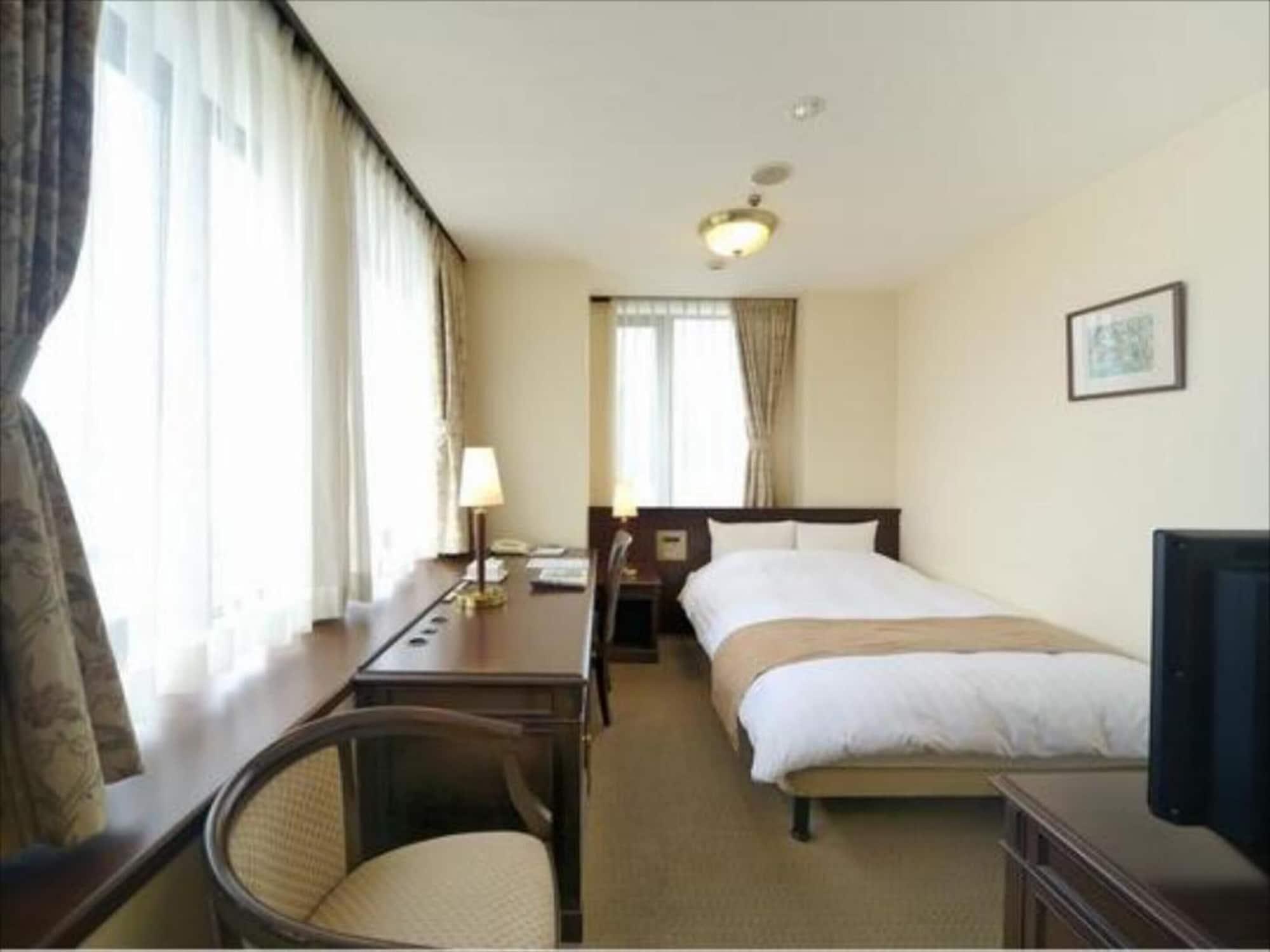 Amami Sunplaza Hotel Exterior photo