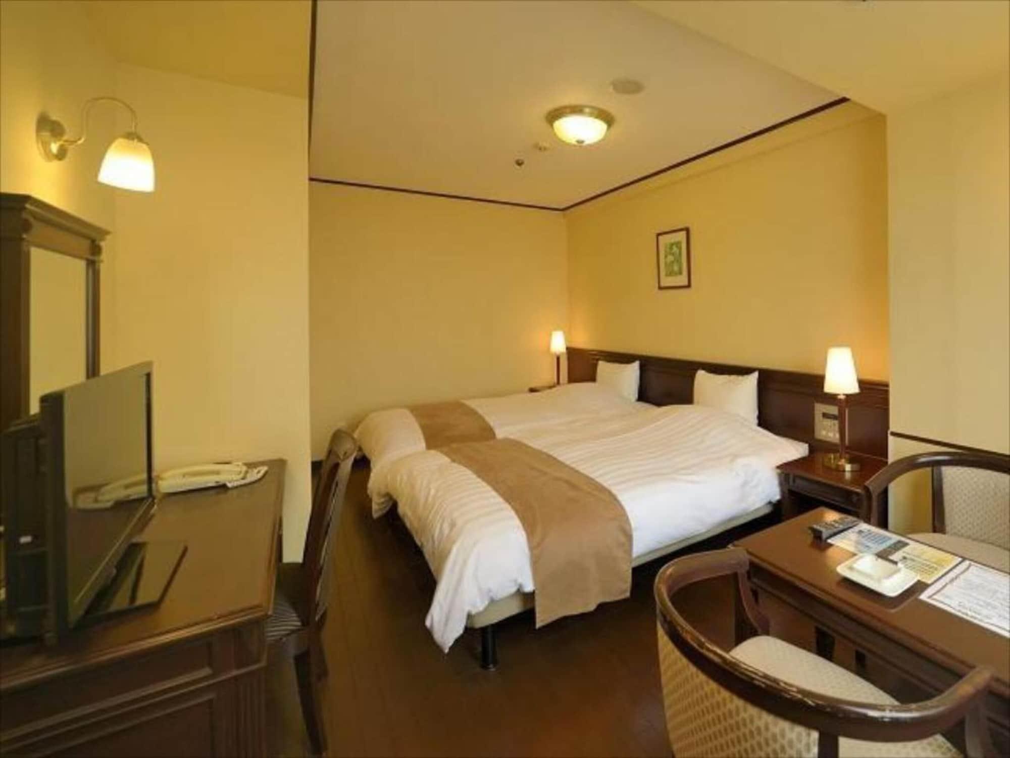 Amami Sunplaza Hotel Exterior photo