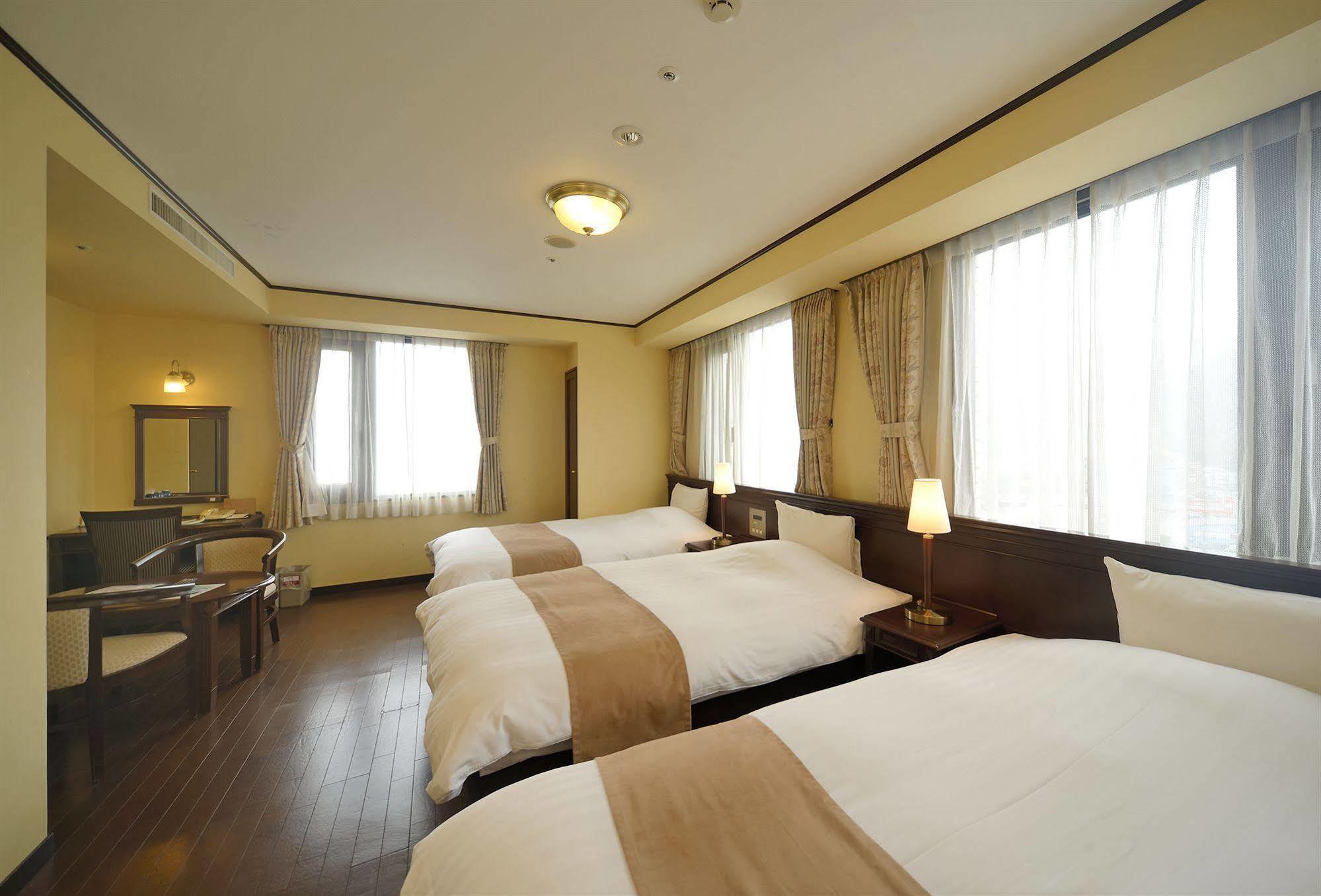 Amami Sunplaza Hotel Exterior photo